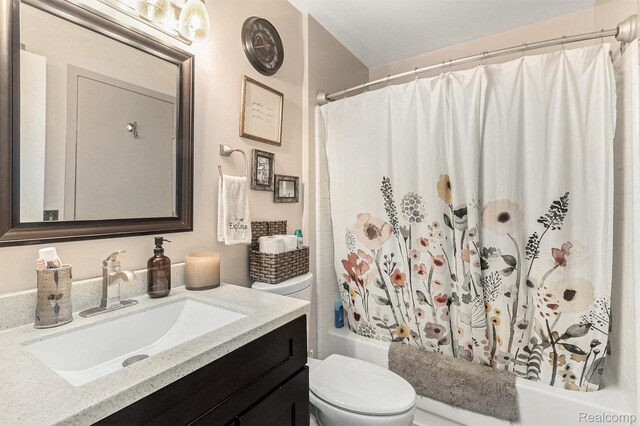 313 Spring Brooke Dr, Brighton, MI 48116 - bathroom featuring toilet, vanity, and shower / bathtub combination with curtain