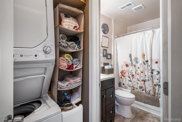 313 Spring Brooke Dr, Brighton, MI 48116 - washroom with estacked washer and dryer and light tile patterned flooring