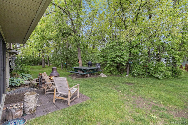 313 Spring Brooke Dr, Brighton, MI 48116 - view of green lawn with a patio area