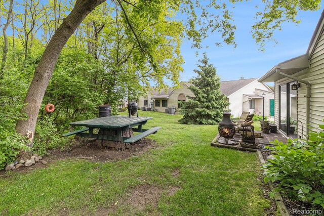 313 Spring Brooke Dr, Brighton, MI 48116 - view of grassy yard featuring a patio area