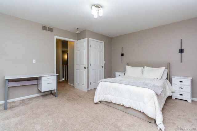 6075 Davison Rd, Burton, MI 48509 - bedroom featuring light carpet and baseboards