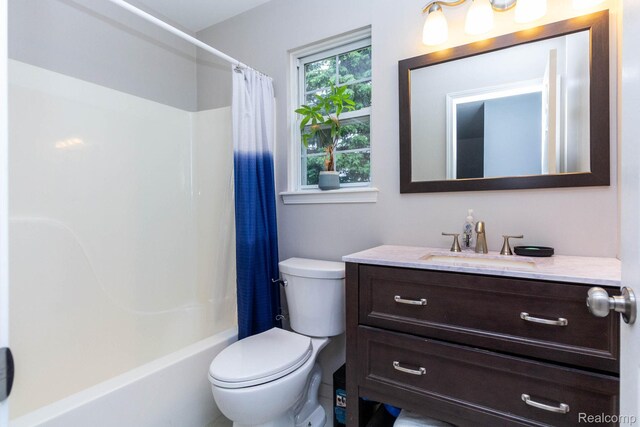 6075 Davison Rd, Burton, MI 48509 - bathroom with toilet, vanity, and shower / bath combo