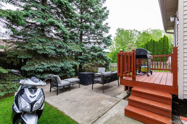 6075 Davison Rd, Burton, MI 48509 - wooden terrace featuring a patio area, an outdoor hangout area, and grilling area