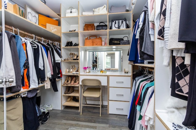 6075 Davison Rd, Burton, MI 48509 - walk in closet with wood finished floors
