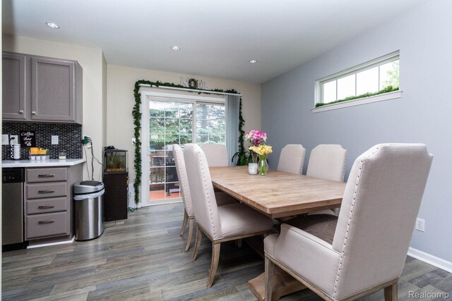 6075 Davison Rd, Burton, MI 48509 - dining room featuring plenty of natural light, wood finished floors, and recessed lighting