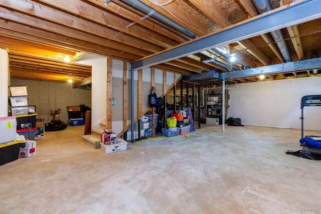 6075 Davison Rd, Burton, MI 48509 - unfinished basement featuring stairs