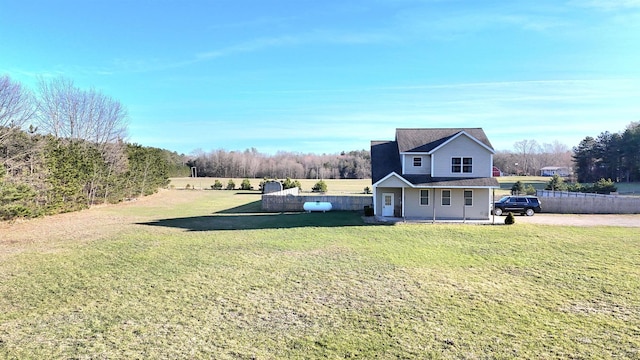 6039 W Morris Lake Rd, Mears, MI 49436 - view of front of property featuring covered porch