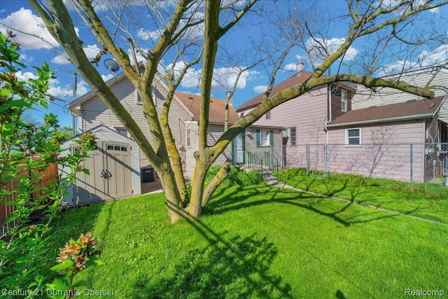 59 E Pleasant St, River Rouge, MI 48218 - view of yard with central AC unit