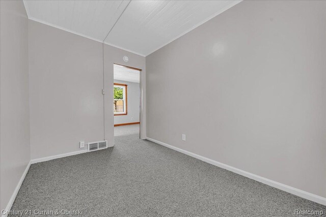 59 E Pleasant St, River Rouge, MI 48218 - unfurnished room with ornamental molding, carpet floors, and baseboards