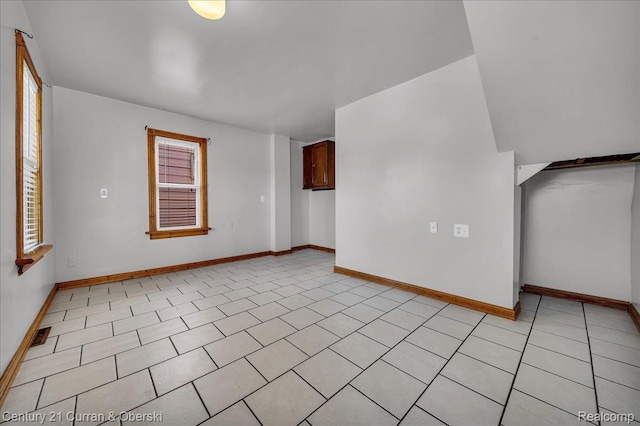 59 E Pleasant St, River Rouge, MI 48218 - unfurnished room with baseboards and light tile patterned flooring