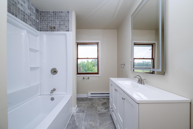 2800 Mayflower Rd, Niles, MI 49120 - full bathroom featuring a baseboard radiator, vanity, baseboards, tub / shower combination, and marble look tiles