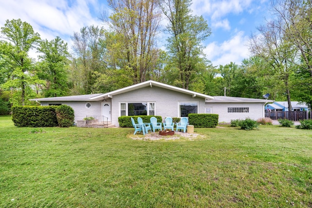 5344 Paw Paw Lake Rd, Coloma, MI 49038 - back of house featuring an outdoor fire pit and brick siding
