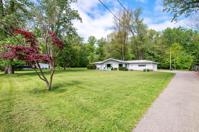 5344 Paw Paw Lake Rd, Coloma, MI 49038 - view of front of home featuring a front lawn and driveway
