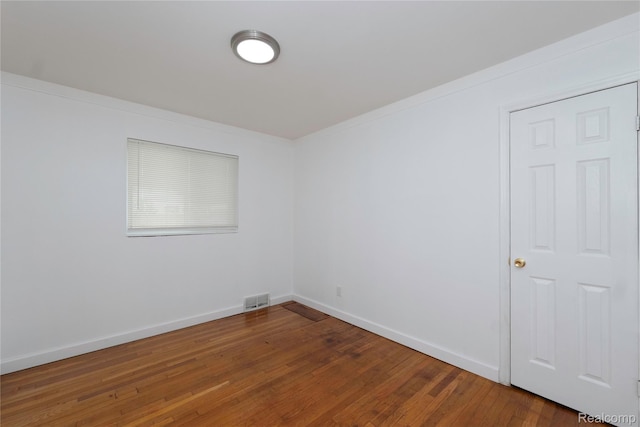 26211 Linwood St, Roseville, MI 48066 - unfurnished room with wood-type flooring and baseboards
