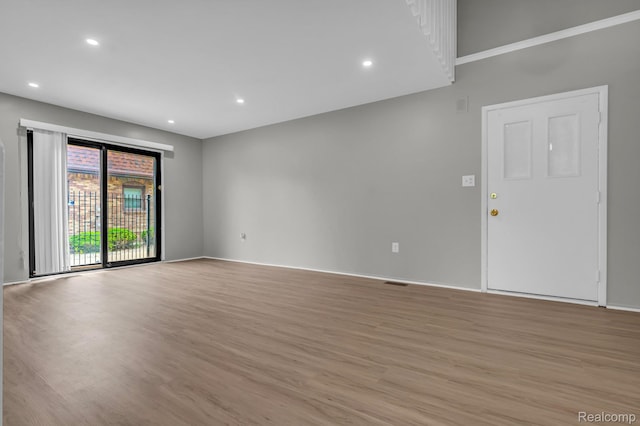5025 Crooks Rd Unit 42, Royal Oak, MI 48073 - unfurnished room featuring light wood finished floors, recessed lighting, and baseboards