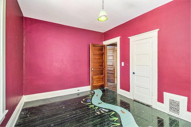 115 N Emily, Ludington, MI 49431 - empty room with baseboards