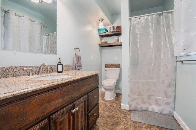 720 Riverside Dr, Constantine, MI 49042 - full bath with vanity, toilet, a shower with curtain, and baseboards