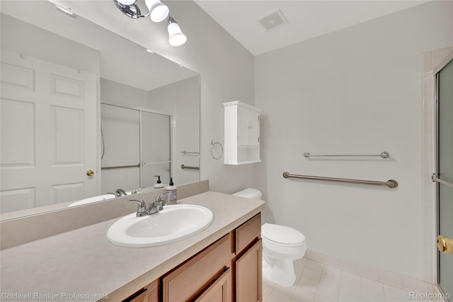 1721 Deepwood Cir, Rochester, MI 48307 - bathroom featuring toilet, a shower with door, vanity, tile patterned floors, and baseboards
