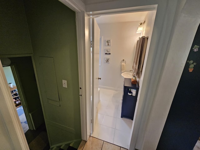 527 Jones St, Grand Ledge, MI 48837 - bathroom with tile patterned flooring and vanity