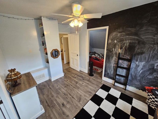 527 Jones St, Grand Ledge, MI 48837 - interior space featuring ceiling fan and wood finished floors