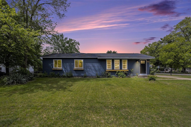 1988 Kregel Ave, Muskegon, MI 49442 - ranch-style house with a lawn