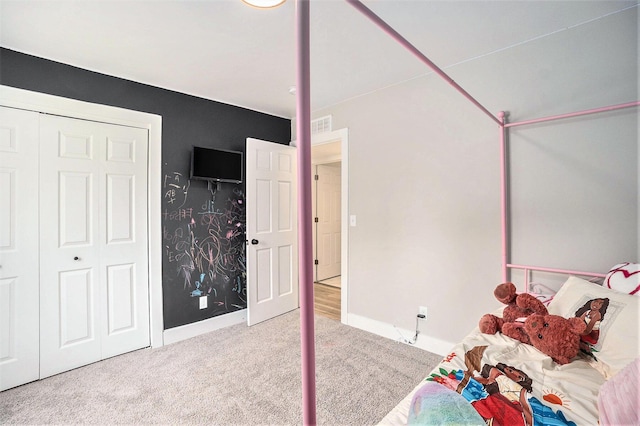1988 Kregel Ave, Muskegon, MI 49442 - bedroom with carpet flooring and baseboards