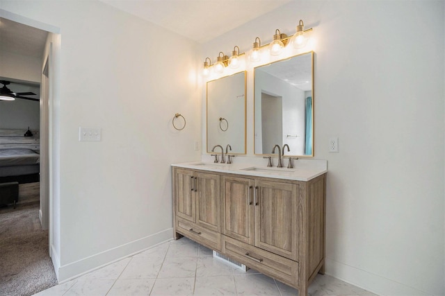 1988 Kregel Ave, Muskegon, MI 49442 - bathroom with ensuite bathroom, double vanity, baseboards, and marble finish floors