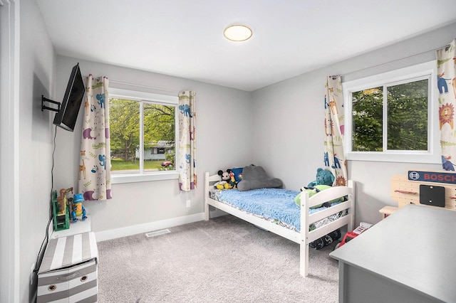 1988 Kregel Ave, Muskegon, MI 49442 - bedroom with carpet floors and baseboards