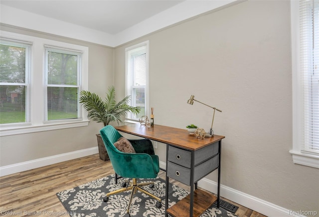 7283 Lozier Ave, Warren, MI 48091 - office featuring baseboards and wood finished floors