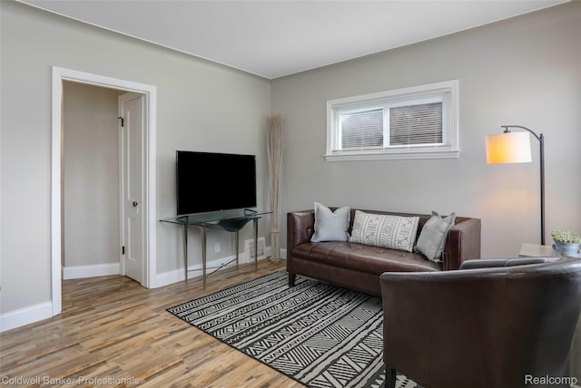 7283 Lozier Ave, Warren, MI 48091 - living area featuring wood finished floors and baseboards