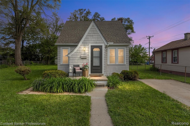 7283 Lozier Ave, Warren, MI 48091 - view of front of home with roof with shingles and a chimney