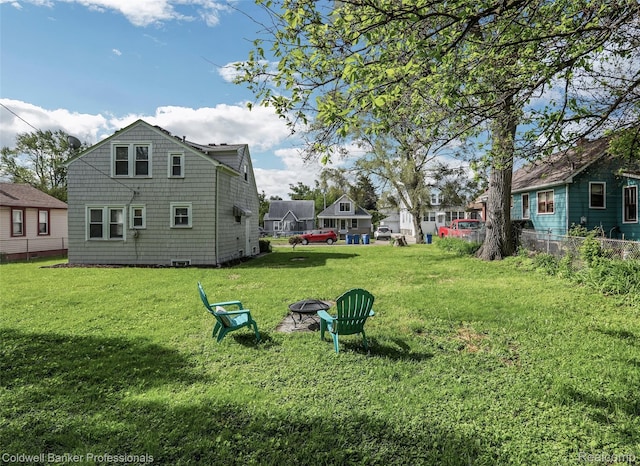 7283 Lozier Ave, Warren, MI 48091 - view of yard featuring an outdoor fire pit