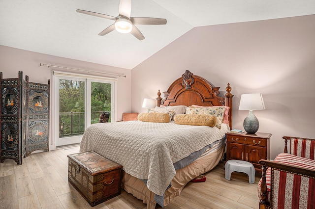 7431 W Buchanan Rd, Shelby, MI 49455 - bedroom featuring lofted ceiling, light wood-style flooring, and ceiling fan