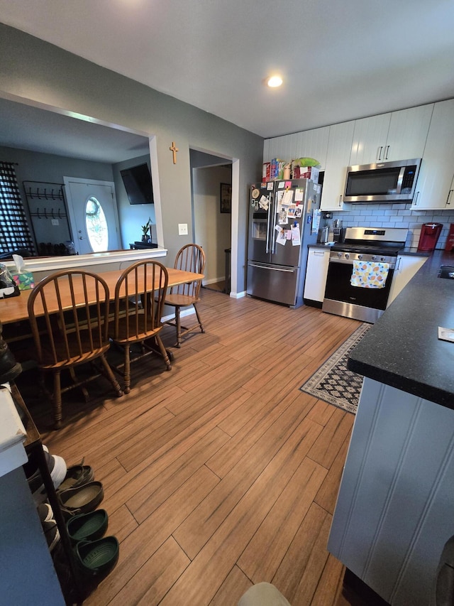 5966 Engleman Ave, Warren, MI 48091 - dining area with light wood-style floors, baseboards, and recessed lighting