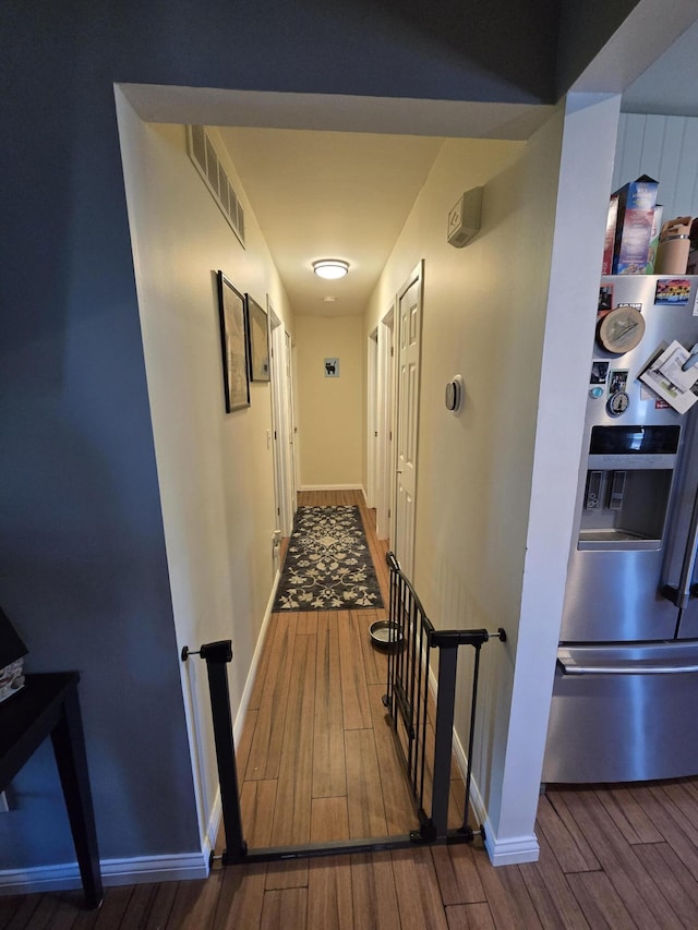 5966 Engleman Ave, Warren, MI 48091 - hallway featuring wood finished floors and baseboards