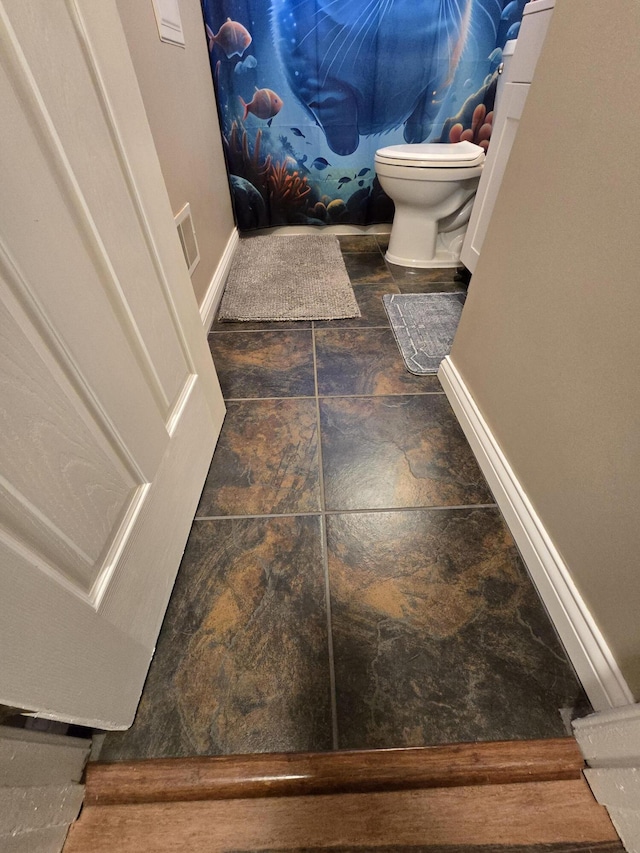 5966 Engleman Ave, Warren, MI 48091 - full bathroom featuring toilet and baseboards