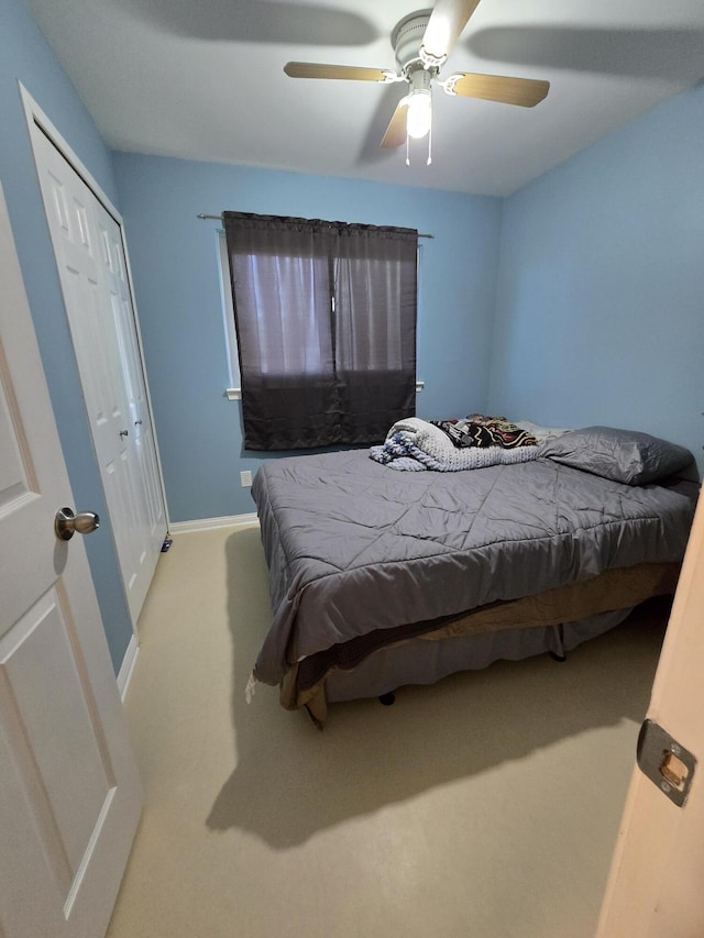 5966 Engleman Ave, Warren, MI 48091 - bedroom featuring carpet floors, a closet, ceiling fan, and baseboards