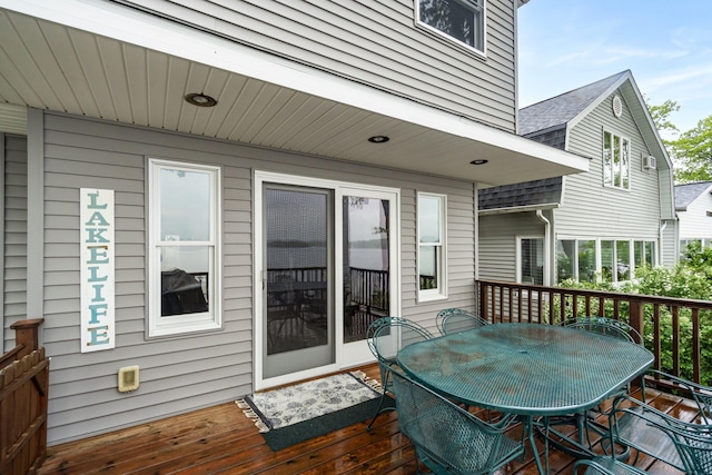 1548 Indian Trl, Pleasant Lake, MI 49272 - wooden deck featuring outdoor dining area