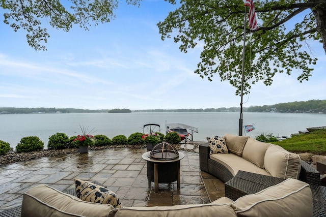 1548 Indian Trl, Pleasant Lake, MI 49272 - view of patio / terrace with an outdoor living space with a fire pit and a water view