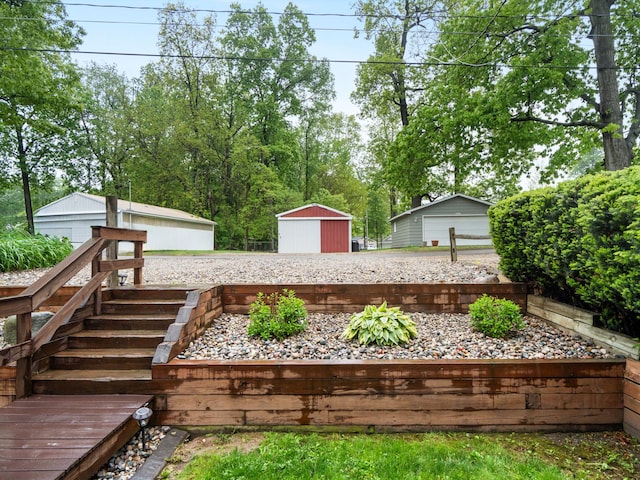 1548 Indian Trl, Pleasant Lake, MI 49272 - wooden terrace with a garage