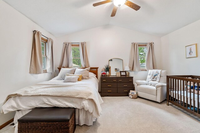 1548 Indian Trl, Pleasant Lake, MI 49272 - bedroom with vaulted ceiling, light colored carpet, multiple windows, and a ceiling fan