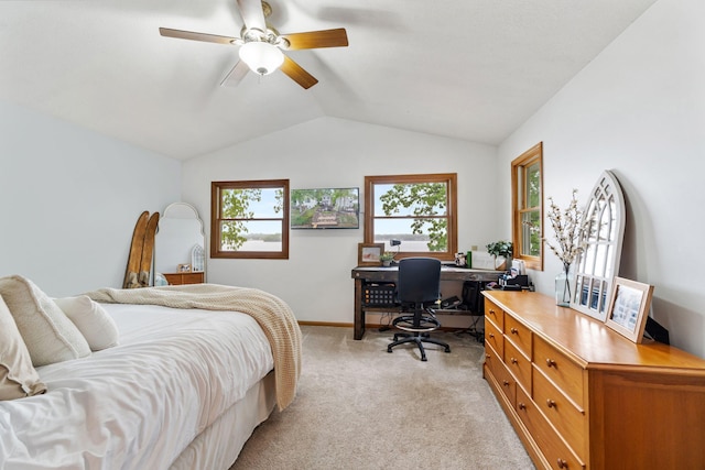 1548 Indian Trl, Pleasant Lake, MI 49272 - bedroom featuring a desk, light carpet, lofted ceiling, baseboards, and ceiling fan