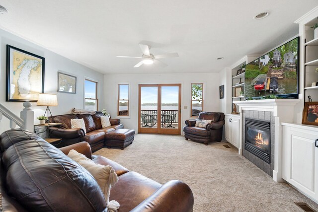1548 Indian Trl, Pleasant Lake, MI 49272 - living area with light colored carpet, healthy amount of natural light, and ceiling fan