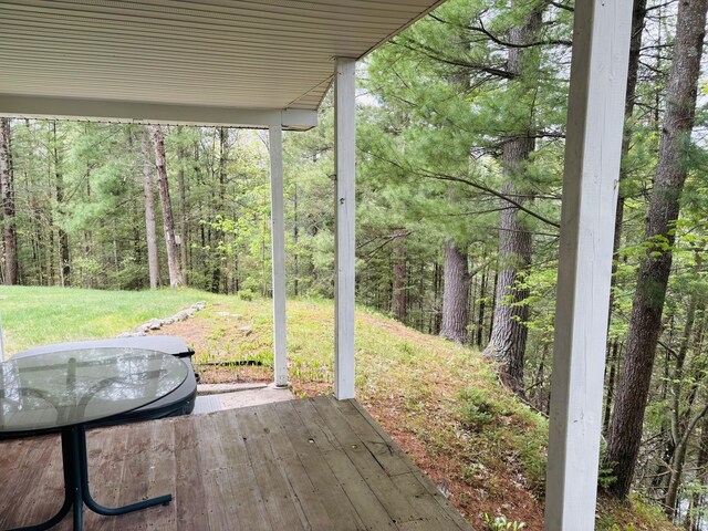 4375 W Haskell Lake Rd, Harrison, MI 48625 - wooden terrace with a view of trees and a yard
