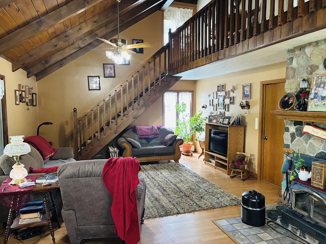 4375 W Haskell Lake Rd, Harrison, MI 48625 - living room featuring stairs, wood finished floors, and ceiling fan