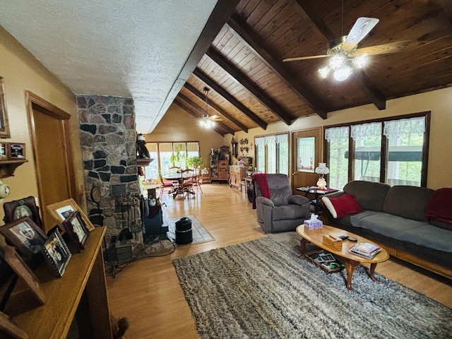 4375 W Haskell Lake Rd, Harrison, MI 48625 - living area with ceiling fan, wood finished floors, and wooden ceiling