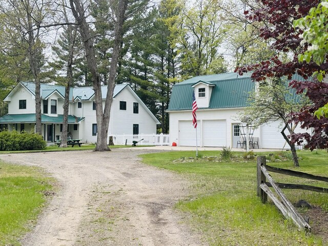 4375 W Haskell Lake Rd, Harrison, MI 48625 - view of front of property featuring driveway and a metal roof