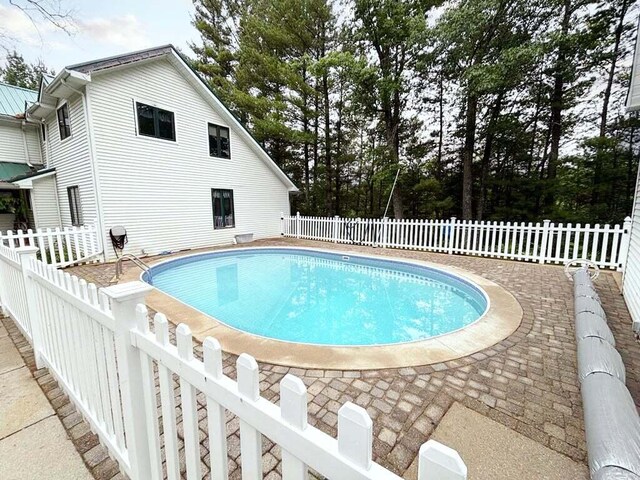 4375 W Haskell Lake Rd, Harrison, MI 48625 - view of pool featuring a fenced backyard and a patio area