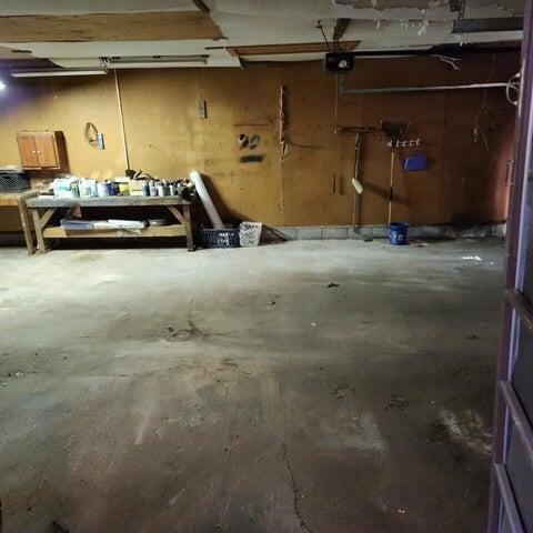 5678 Leona Ave, Muskegon, MI 49442 - garage with a garage door opener