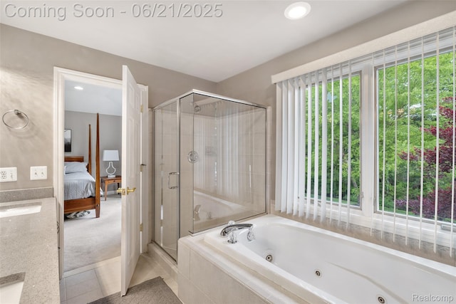 55161 Whitney Dr, Shelby Twp, MI 48315 - ensuite bathroom featuring a stall shower, a whirlpool tub, tile patterned flooring, and recessed lighting